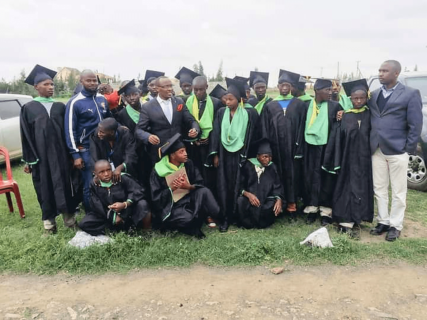 Graduates in caps and gowns after completing a training program